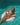 Woman in a bikini lying on an inflatable ring in clear blue water
