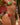 Person wearing a colorful bikini with floral patterns in an outdoor setting